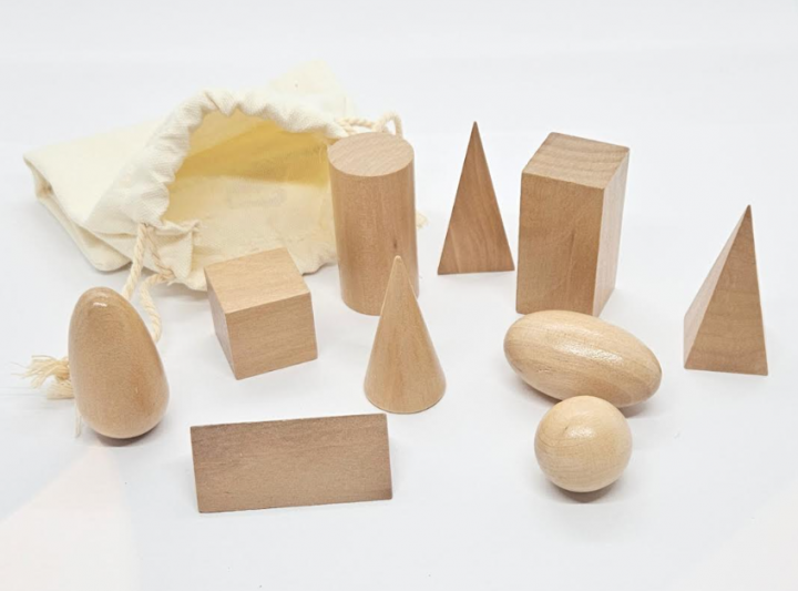 math manipulatives for kids shows 3d shapes made from wood.