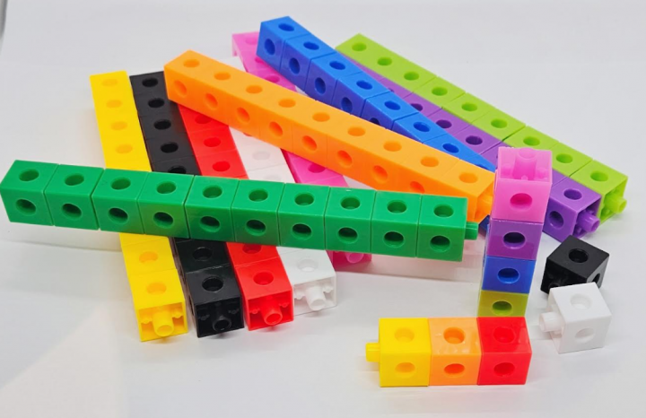math tools shows a pile of counting cubes all different colors.